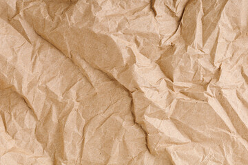 Brown texture kraft paper, recycled cardstock. Old crumpled recycled paper of old crumpled recycled paper