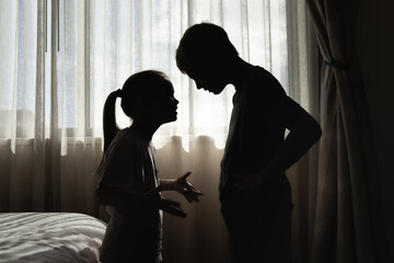 Brother sister fighting upset shouting angry having a disagreement. Siblings rivalry. Family children relationship problems.  