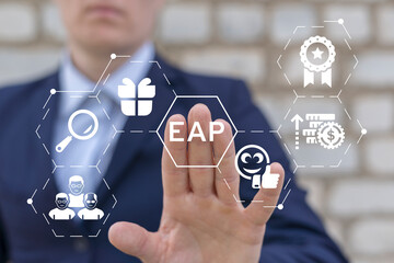 Business person using virtual touch screen presses acronym: EAP. Concept of EAP Employee Assistance Program Business Care.