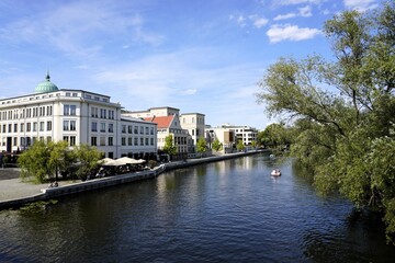 Panorama view of the Potsdam cityscape with the landmark dome of St. Nicholas' Church by the river Havel on a sunny summer day