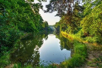 Fototapete Rakotzbrücke Rakotz Bridge (Rakotzbrucke, Devil's Bridge) in Kromlau, Saxony, Germany. Colorful summer, reflection of the bridge in the water create a full circle  © Pawel Pajor