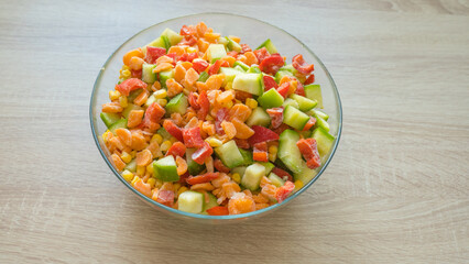 Frozen mixed vegetables, carrots, corn, peppers and zucchini. Preparations for the winter