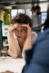 Exasperated business leader dealing with a stressful situation at the office, failing to expand the...