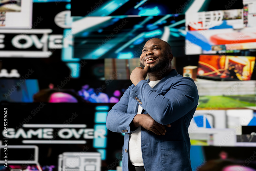 Poster african american young guy connected to a global network through mobile devices, opening apps and st