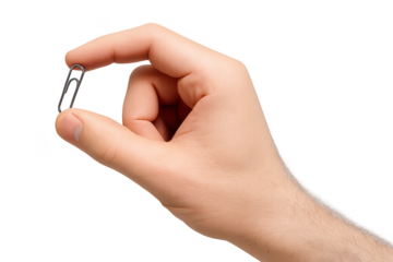 Hand holding a silver paperclip isolated on a transparent background, office stationery item.