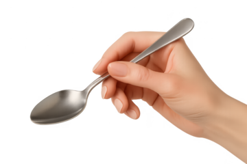 Female hand holding a shiny metal spoon isolated on a transparent background