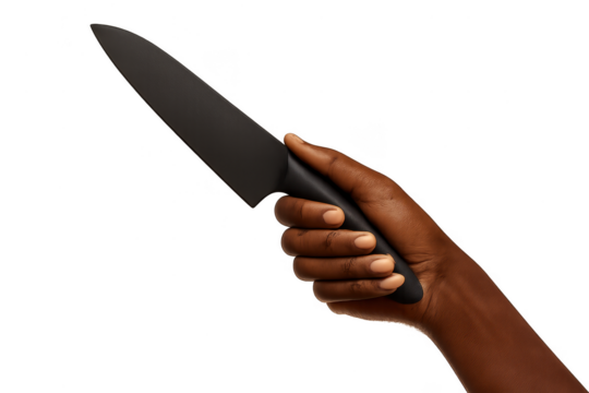 Dark hand holding a black chef's knife, isolated on a transparent background.