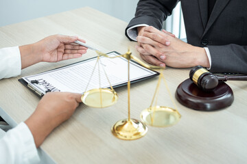 Professional Male lawyer or counselor discussing negotiation legal case with client meeting with...