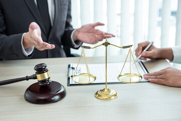 Professional Male lawyer or counselor discussing negotiation legal case with client meeting with...