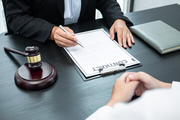 Professional Male lawyer or counselor discussing negotiation legal case with client meeting with document contract in office, law and justice, attorney, lawsuit concept