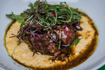 Gourmet veal roast with creamy polenta and a savory sauce in Zurich, Switzerland