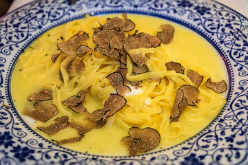 Gourmet linguini with truffles and burrata in a restaurant, Zurich, Switzerland