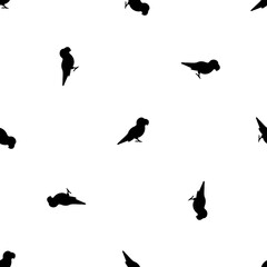 Seamless pattern of repeated black parrot symbols. Elements are evenly spaced and some are rotated. Illustration on transparent background