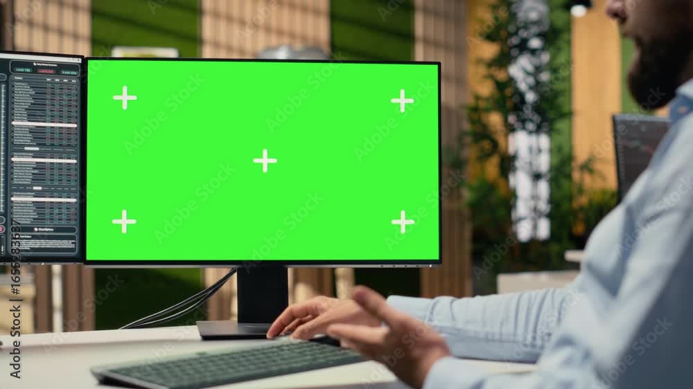 Poster close up of investment consultant using green screen pc to review client portfolio in office. trader
