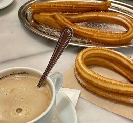 Spanish churros with latte coffee
