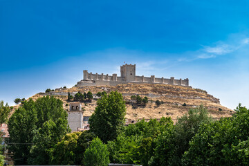 Peñafiel, Valladolid, Spain – View of the medieval castle on a sunny summer day, showcasing its...