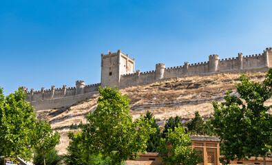 Peñafiel, Valladolid, Spain – View of the medieval castle on a sunny summer day, showcasing its...