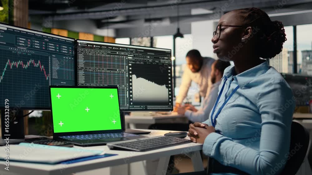 Poster prop firm trader in office learns new trading strategies from video lesson on isolated screen laptop