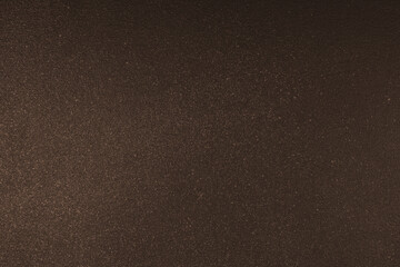 Abstract shiny, radiant texture background with different shades of dark brown color. Painted...