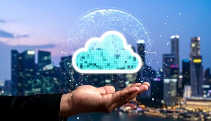 A hand holds a digital cloud icon, glowing with teal pixels, against a backdrop of a city skyline at twilight.