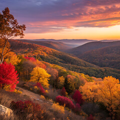 Obraz premium Vibrant autumn mountain landscape at sunrise with colorful trees and hazy valley
