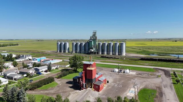 Grain elevator in the small town in Alberta in summer.