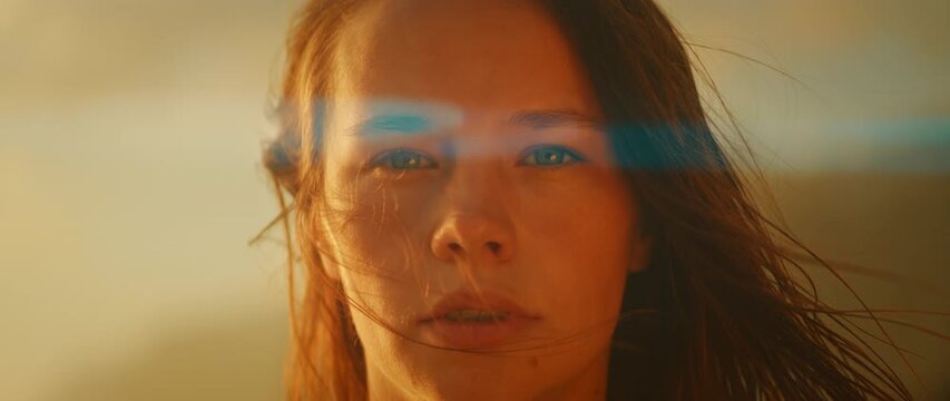 Close-up of woman with eyes closed in serene outdoor lighting