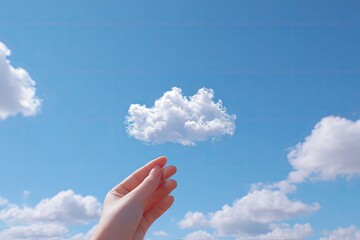 A hand reaching for a fluffy white cloud against a vibrant blue sky (1)
