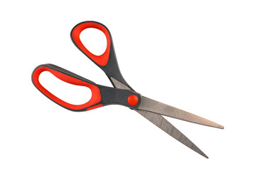 Close-up of red and black scissors with stainless steel blades isolated on white background. Ideal...
