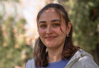 portrait of a young woman on the park