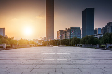 Serene Sunset Over Urban Landscape with Towering Skyscrapers