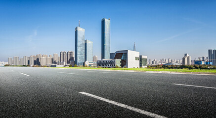 Urban Skyline Featuring Modern Architecture with Clear Blue Sky