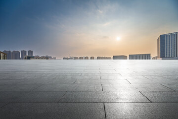 Urban Landscape at Sunset with Reflective Pavement