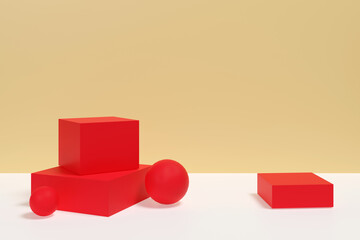 A red cube and three red balls are on a white table