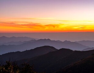Obraz premium Sunrise over mountain ranges