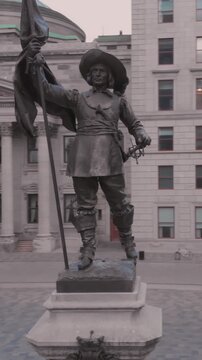 Paul de Chomedey, sieur de Maisonneuve statue in Place d'Armes, Montreal, Canada. The statue commemorates the founder of Montreal.
