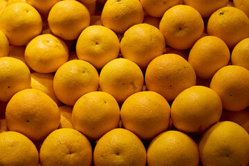 A Vibrant Display of Fresh Oranges at a Local Market for All to Enjoy and Purchase