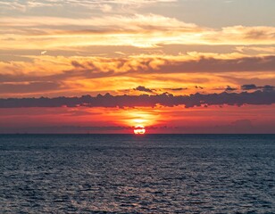 Naklejka premium Sunset over the ocean