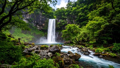 Lush waterfall cascading through a verdant valley (1)
