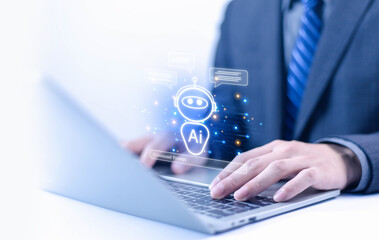 Man using laptop to chat with AI Chatbot Assistant or Artificial Intelligence Technology, Holographic Robot Application and Global Connectivity