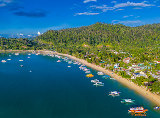 Port Barton, San Vicente. Palawan island resort in Philippines. Aerial drone view of cozy coastal...