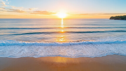 Fototapeta premium Sunset over ocean waves creates serene atmosphere with golden reflections on water