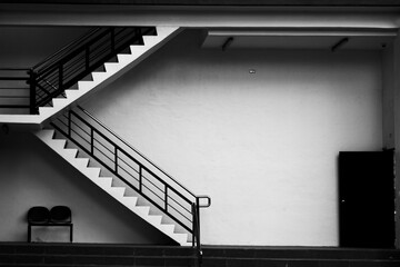 Silent Geometry: Stairs, Door & Shadows