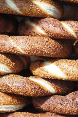 Freshly baked turkish simit stacked on display