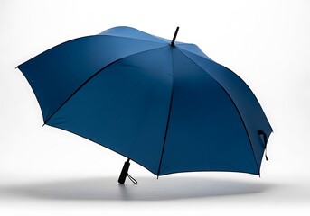 Open blue umbrella casting soft shadow on white background, studio shot