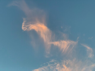 Fototapeta premium Blue sky with white streaky clouds.