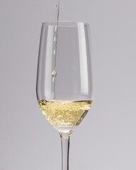 Tequila reposado being poured into glass