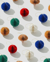 Paper Christmas Ornaments, hanging colored New Year decorations as round balls, Christmas tree,...