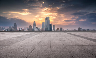 Obraz premium Stunning City Skyline at Sunset with Urban Rooftop Perspective