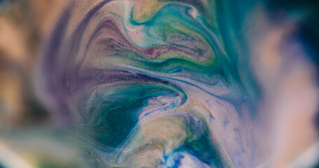 Blur paint flow. Wave mix. Defocused blue purple green colorful sparkling wet pigment spreading on...
